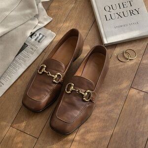 Elegant Brown Loafers with Gold Detailing